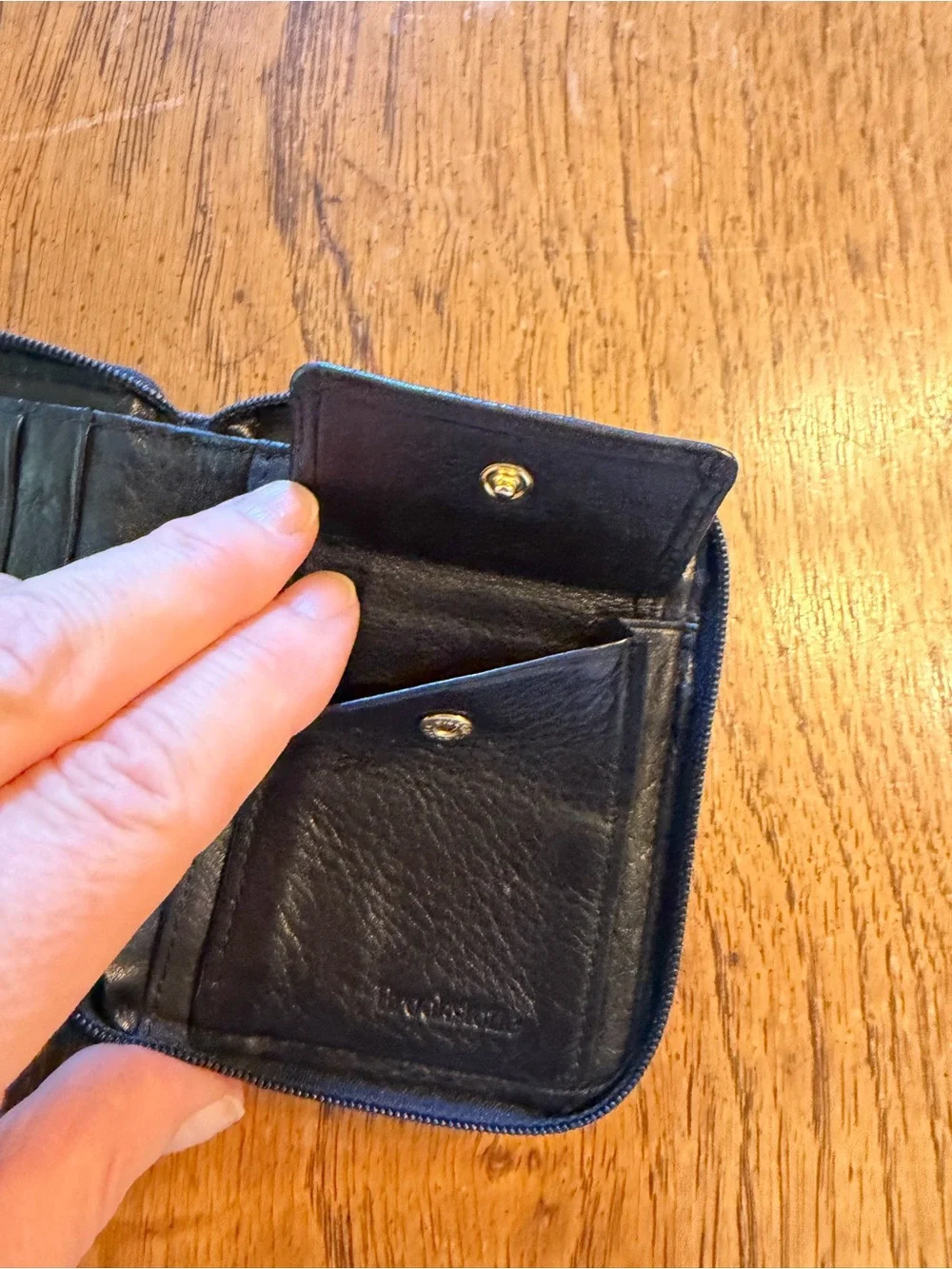 Brookstone Black Leather Zip Wallet with Embossed Logo